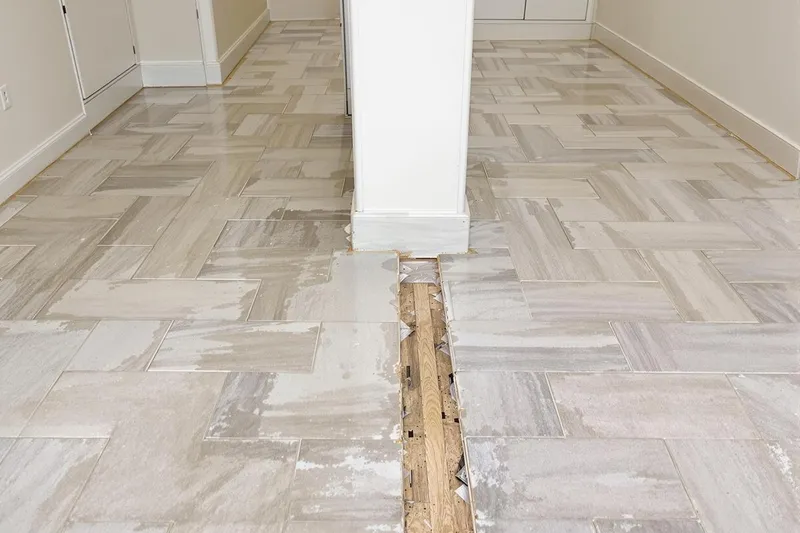 Raccord sol carrelage après démolition cloison